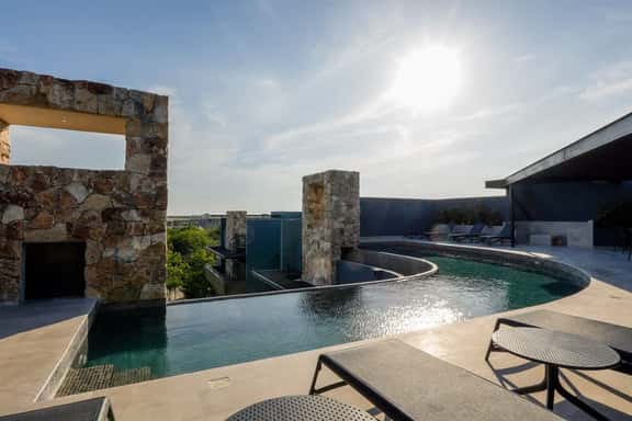 Premium Condo w/ Rooftop Pool & Gym in Aldea Zama - Image 1